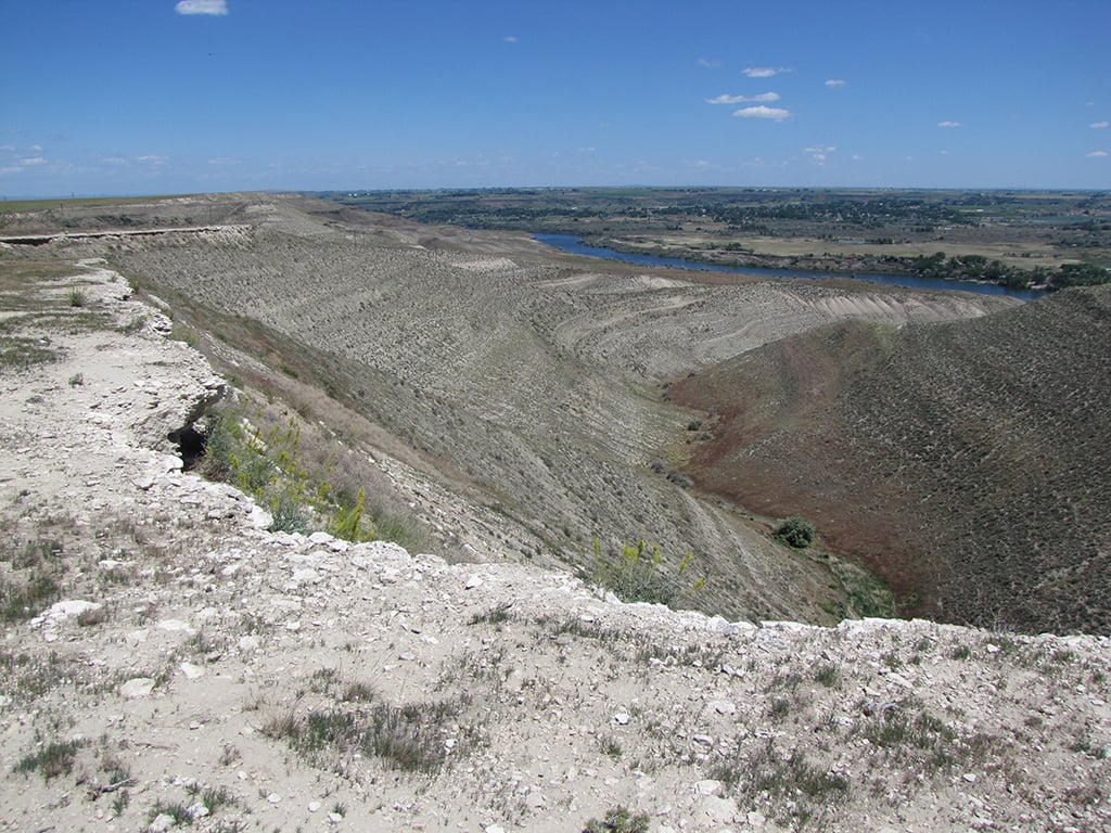 Rough crumbling edges at the top of long steep slopes at Hagerman Fossil Beds National Monument