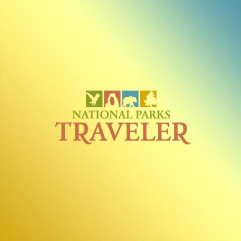 The Traveler logo on a blue and orange gradient background