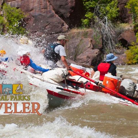 A raft floating down a river in Dinosaur National Monument. Photo by Pat Cone 6-2016.