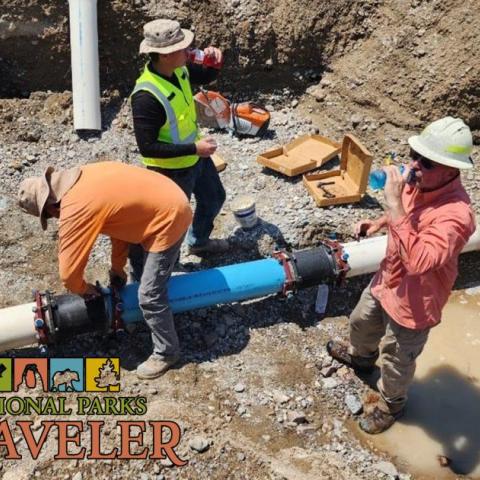 Workers fix broken pipes at Death Valley National Park. NPS photo.