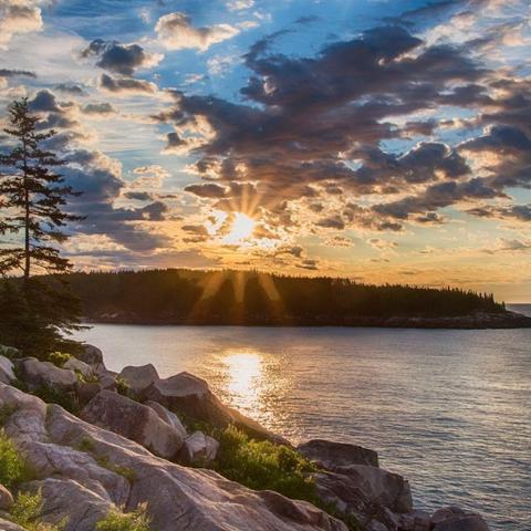 Sunrise over the coastline at Acadia National Park in Maine. Interior Department photo.