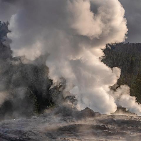 An Early Morning Old Faithful Eruption Aftermath at Yellowstone National Park. Photo by Rebecca Latson.