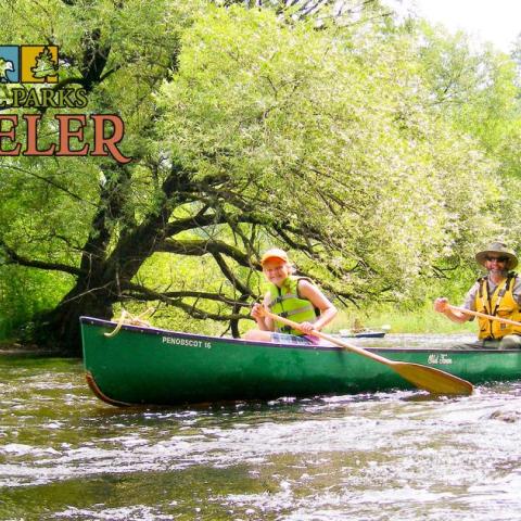 Two canoes paddling down the the Namekagon River at SACN. NPS Photo.