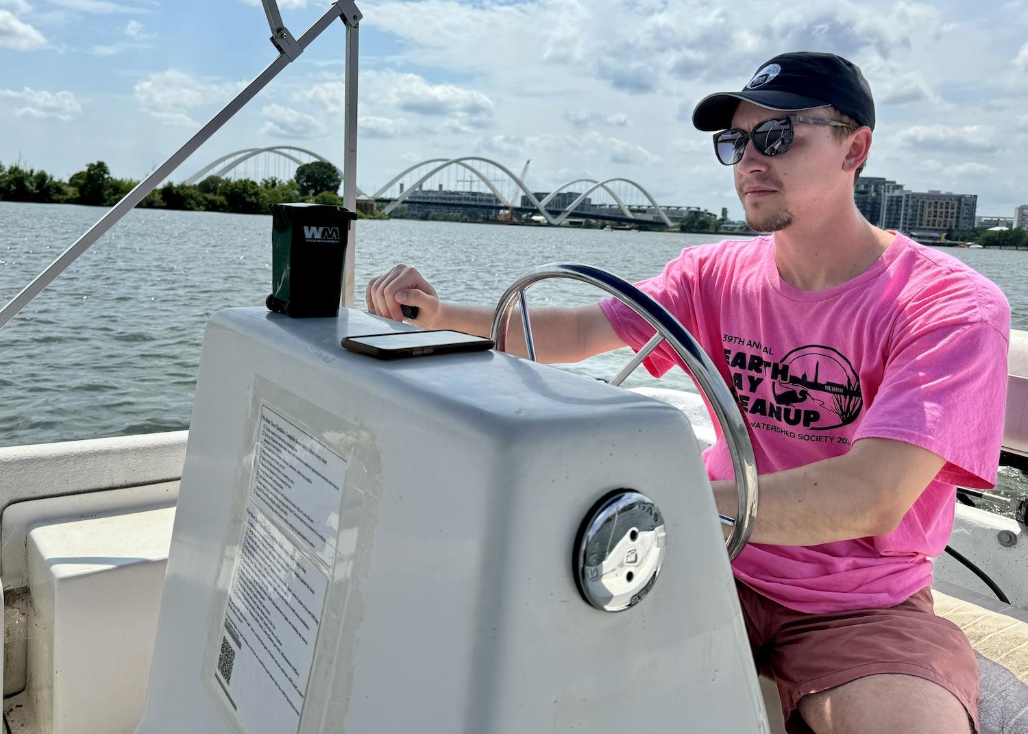 Anacostia Watershed Society's Austin DeOrio takes a pontoon boat down the Anacostia River during Late Skate events at Anacostia Park.