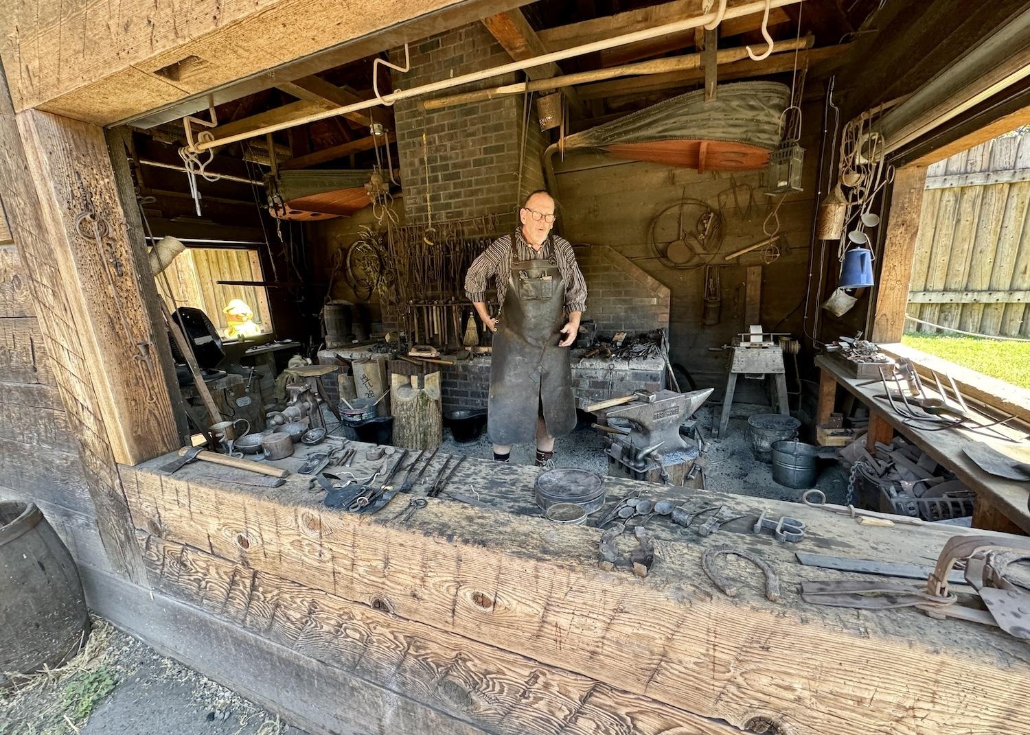 There's usually a crowd gathered in front of the blacksmith shop at Fort Langley where Danny Cram works four days a week.