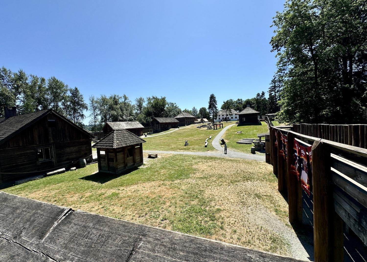 A view of the original and reconstructed buildings inside the walls at Fort Langley.