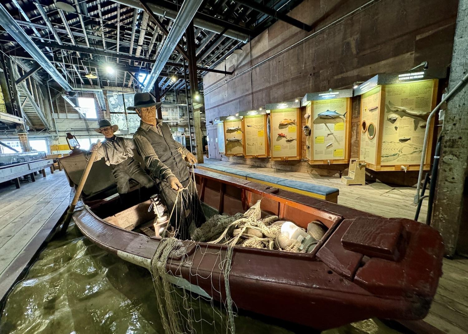 In the early 1900s, small wooden commercial fishing boats held two men who did gillnet fishing.