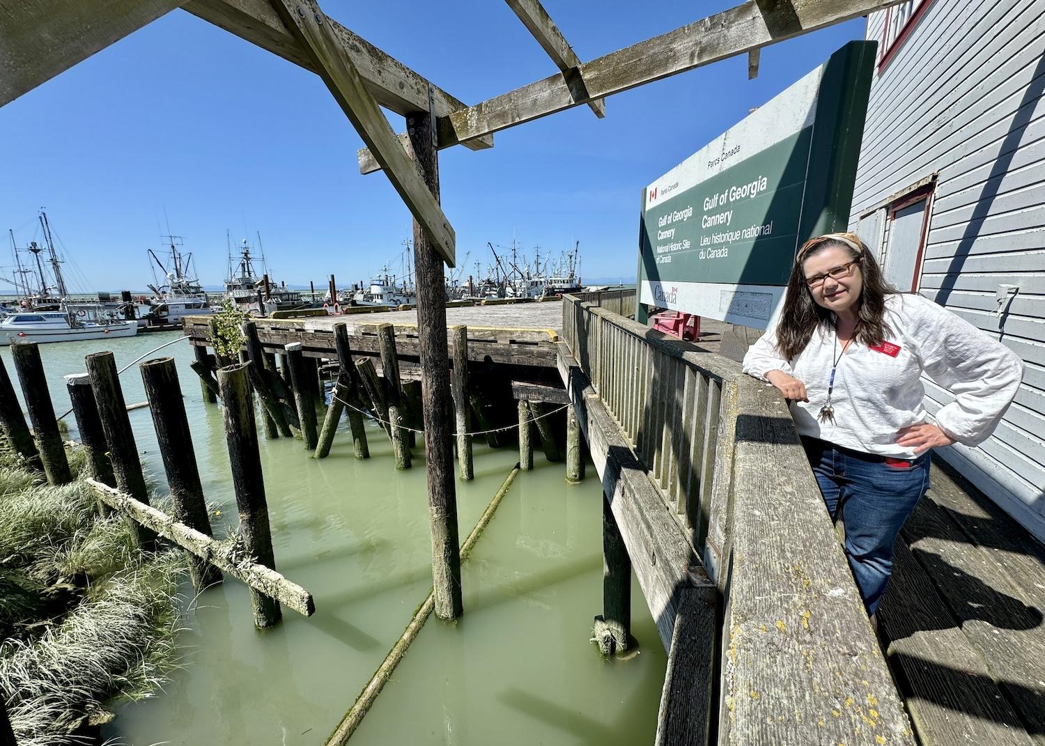 At the Gulf of Georgia Cannery National Historic Site, executive director Elizabeth Batista shows how the building sits atop wooden pilings.