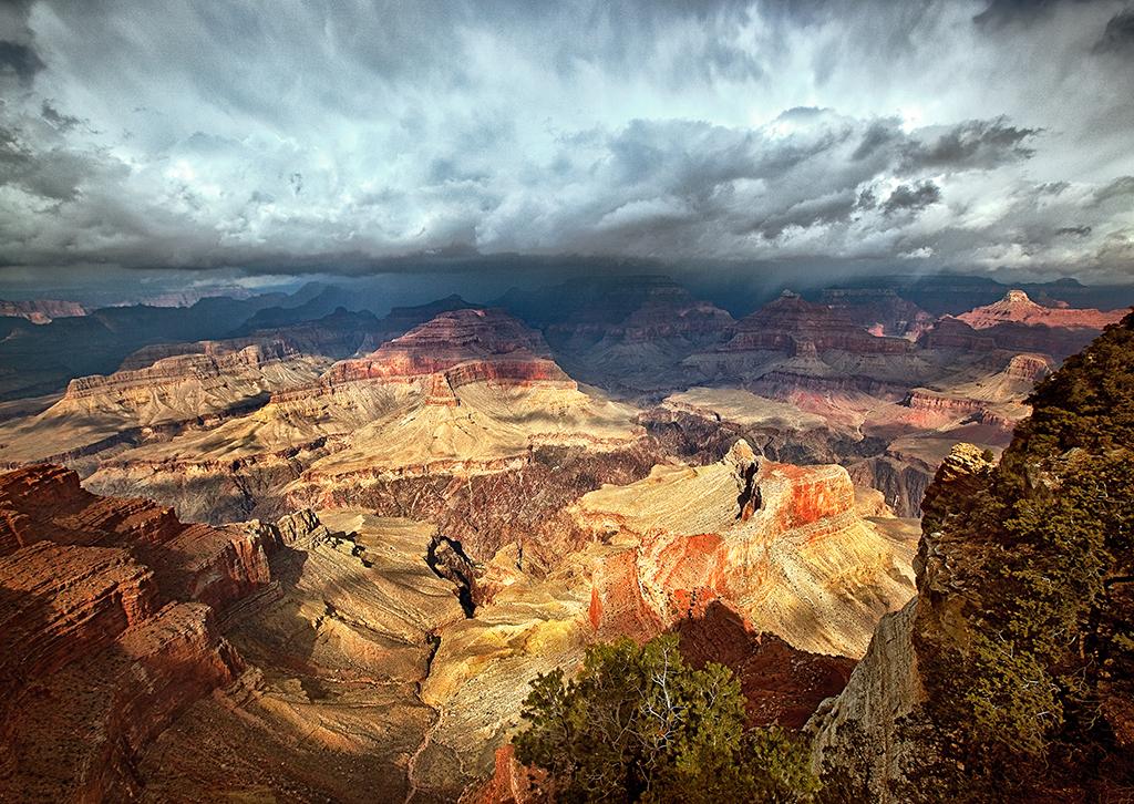 Autumn sunlight and stormclouds along the South Rim, Grand Canyon National Park / Rebecca Latson