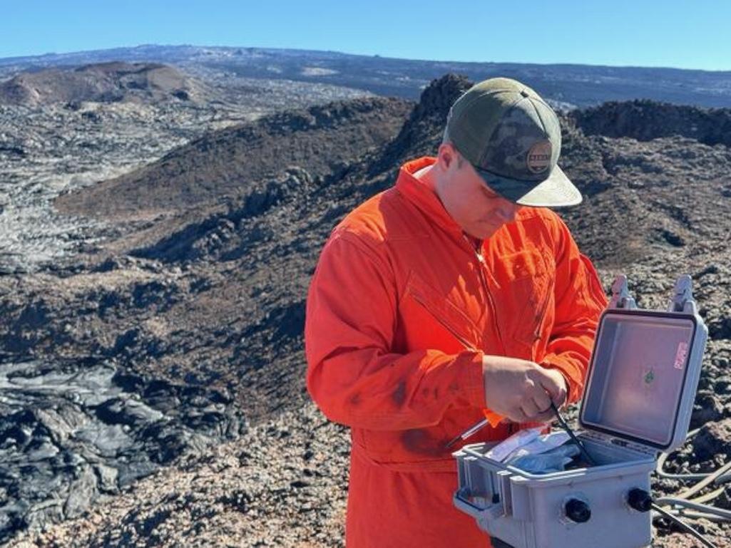 An HVO physical science technician upgrades the M3cam webcam on the Southwest Rift Zone of Mauna Loa. This webcam points northeast (uprift), towards the summit of Mauna Loa, to cover portions of the upper Southwest Rift Zone. The upgrade included a higher