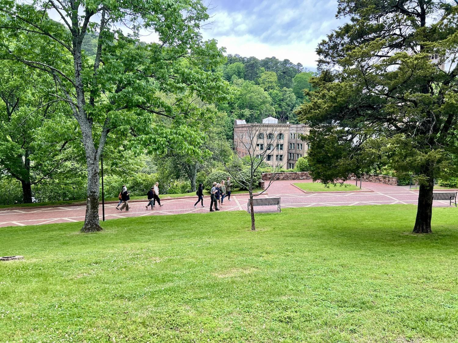 NPS ranger Kendra Barat leads a public tour along the Grand Promenade in Hot Springs National Park in Hot Springs, Arkansas.