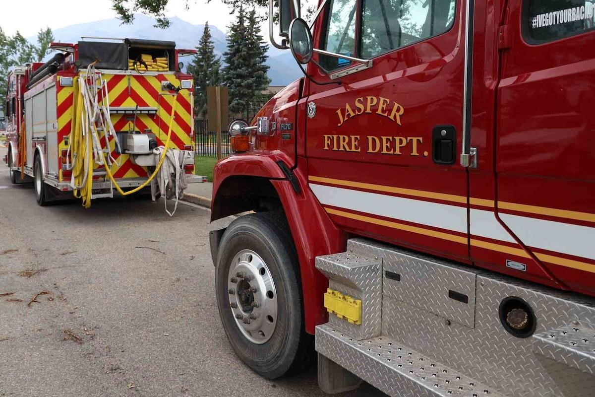 Jasper National Park remains closed as crews fight a wildfire that reached the townsite.