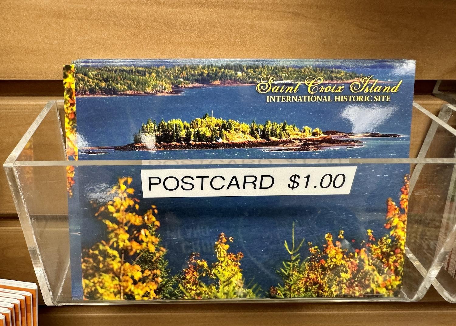 In the U.S. ranger station gift shop, a postcard showcases the island that you're supposed to look at from shore but not visit.