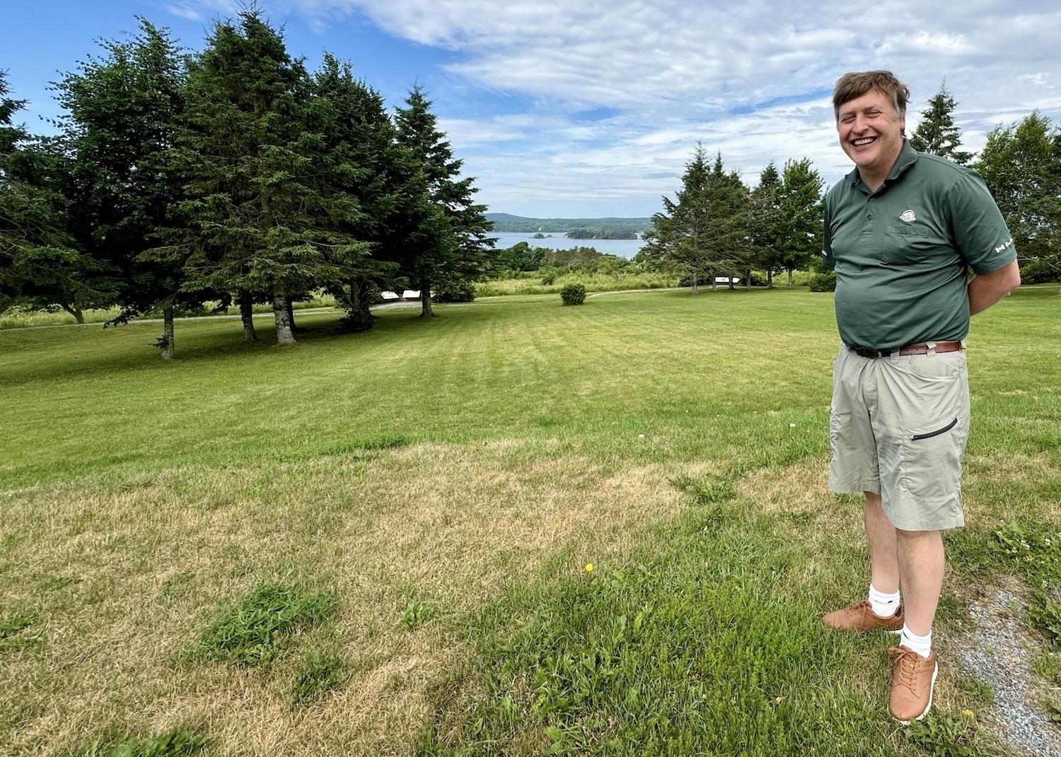 Parks Canada's Kurt Peacock shows how you can only view Saint Croix Island from afar at the Canadian side of the international historic park.