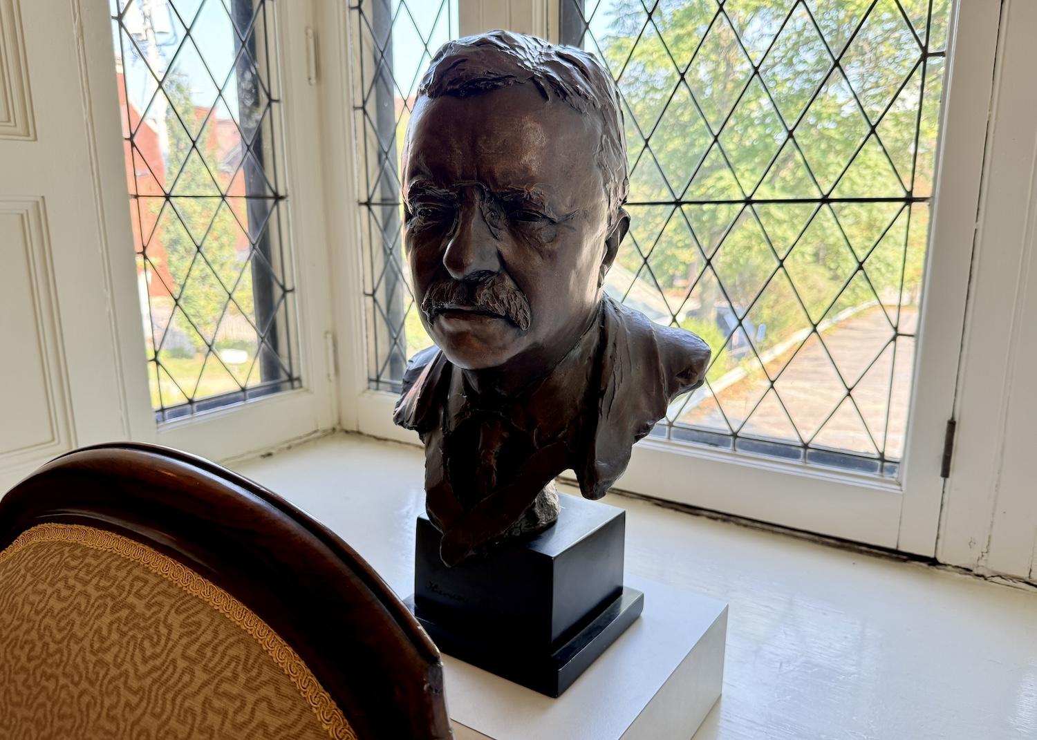 A bust of President Theodore Roosevelt sits in the window of one of the restored rooms.