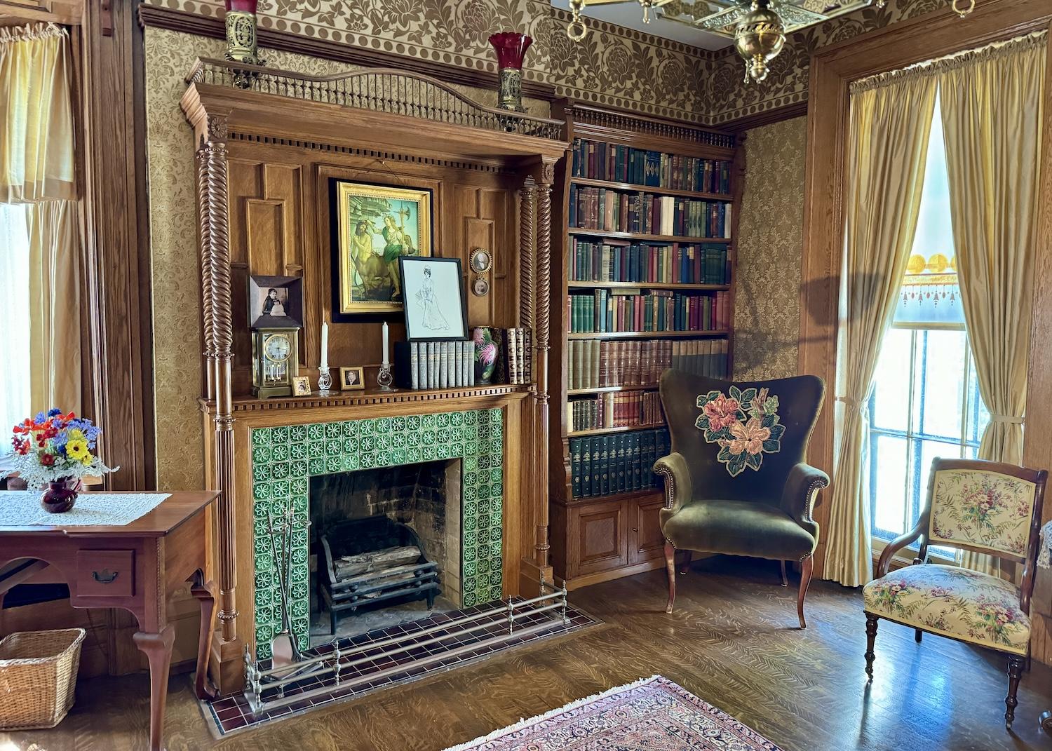 The books at the north end of the library were salvaged from the Wilcox era. The clock on the fireplace mantle is set to the time of President Theodore Roosevelt's inauguration.