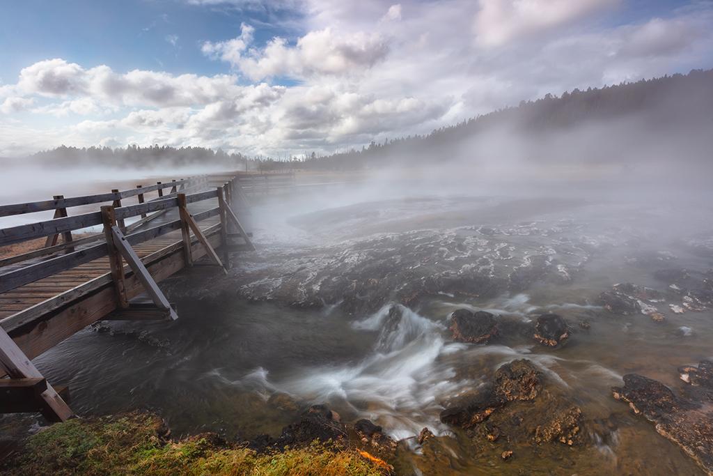 A circular polarizer, slow shutter speed, and tripod helped capture this "silky water" image of Hot Cascades along the Firehole Lake Drive in Yellowstone National Park / Rebecca Latson